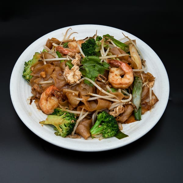 Hiccups' Asian-fusion stir-fried noodles with shrimp, broccoli, bean sprouts, and green onions.